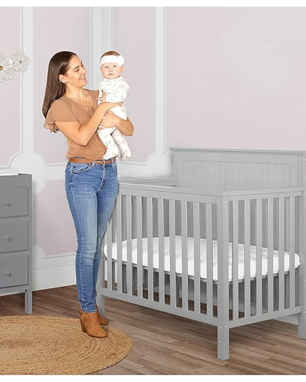 Ava 4-in-1 Convertible Mini Crib in Pebble Grey, 635-PG, Greenguard Gold Certified, Non-Toxic Finish, Comes with 1" Mattress Pad, with 3 Mattress Height Settings - LeafyLoom