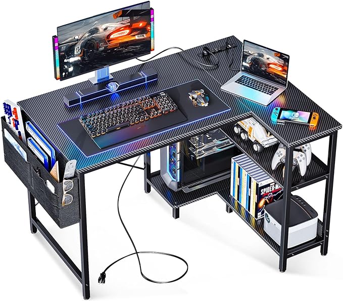 ODK 40 Inch Small L Shaped Gaming Computer Desk with Power Outlets,Corner Desk with Reversible Storage Shelves & PC Stand for Small Space, Modern Simple Home Office Table, Carbon Fiber Surface, Black - LeafyLoom