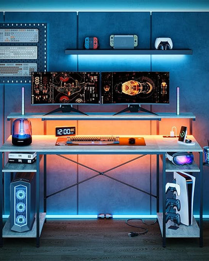 Bestier Computer Desk with Reversible Power Outlets, 55 inch LED Gaming Desk with Monitor Stand & Adjustable Shelves, Writing Desk with Cup Holder & Hook for Home Office, Retro Grey Oak-Light - LeafyLoom