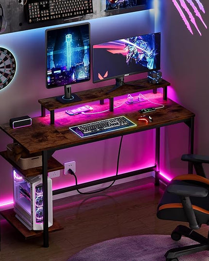 Furologee Desk with Power Outlets and LED Lights, 47" Computer Office Desk with Shelves and Fabric Drawer, Reversible Gaming Study Table with Monitor Stand and Hooks, Rustic Brown - LeafyLoom