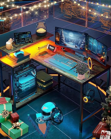 Bestier Small Gaming Desk with Power Outlets,42 L Shaped LED Computer Desk with Stand Reversible Shelves,Corner Gamer Desk with Headset Hooks USB Charging Port,Carbon Fiber Black - LeafyLoom