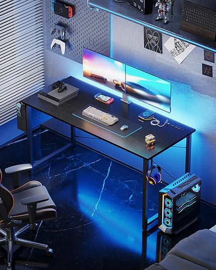 KKL Small Desk with Power Outlets and USB Port Computer Desk for Home Office Gaming Simple Modern Style Writing Desks with Storage Bag Headphone Hook, 48 inch, Black - LeafyLoom