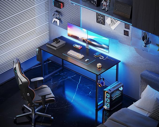 KKL Small Desk with Power Outlets and USB Port Computer Desk for Home Office Gaming Simple Modern Style Writing Desks with Storage Bag Headphone Hook, 48 inch, Black - LeafyLoom