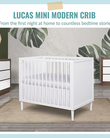 Lucas Mini Modern Crib with Rounded Spindles in White , 39x25.5x33 Inch (Pack of 1) - LeafyLoom
