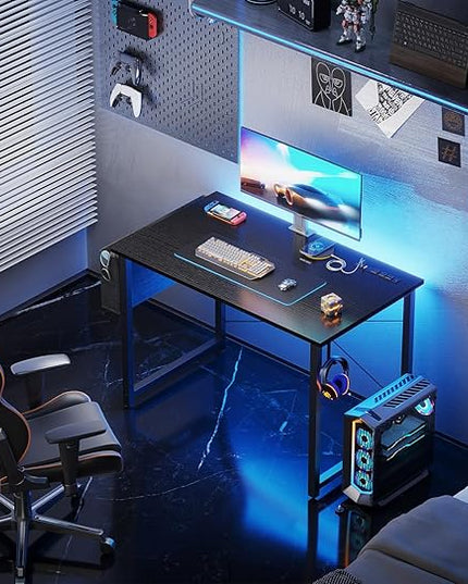 KKL Small Desk with Power Outlets and USB Port Computer Desk for Home Office Gaming Simple Modern Style Writing Desks with Storage Bag Headphone Hook, 32 inch, Black - LeafyLoom