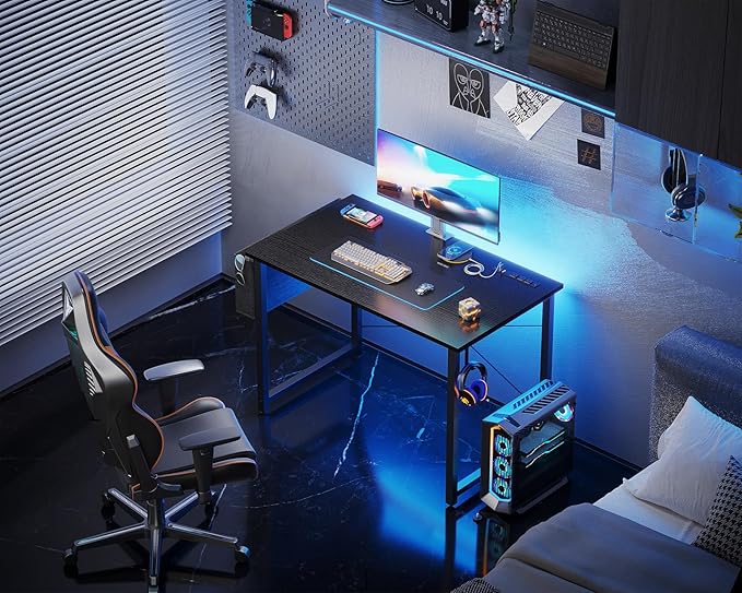 KKL Small Desk with Power Outlets and USB Port Computer Desk for Home Office Gaming Simple Modern Style Writing Desks with Storage Bag Headphone Hook, 32 inch, Black - LeafyLoom