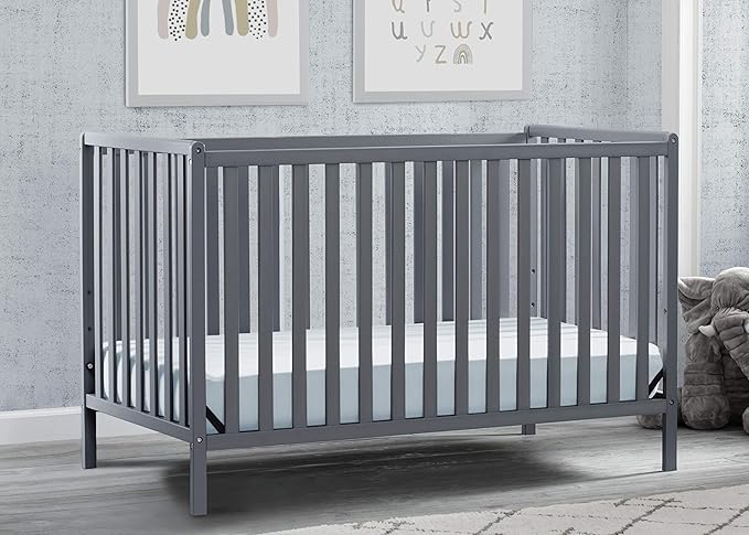 Delta Children Heartland 4-in-1 Convertible Crib, Charcoal Grey + Delta Children Twinkle Galaxy Dual Sided Recycled Fiber Core Crib and Toddler Mattress (Bundle) - LeafyLoom