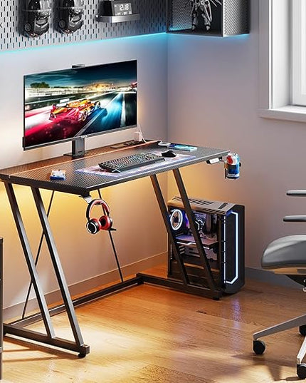 MOTPK Small Gaming Desk with LED Lights & Power Outlet, Computer Desk 39inch for Small Space, Cheap Gaming Table with Carbon Fiber Texture, Kids Desk Gift for Boys Men, Black - LeafyLoom