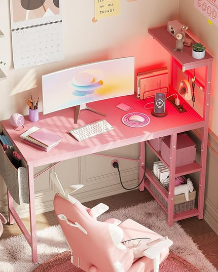 Bestier Pink Gaming Desk with Power Outlets, 44 Inch Led Gamer Desk with 4 Tiers Reversible Shelves, Pink Computer Desk with Headset Hook & Side Storage Bag for Bedroom (Pink 3D Carbon Fiber) - LeafyLoom