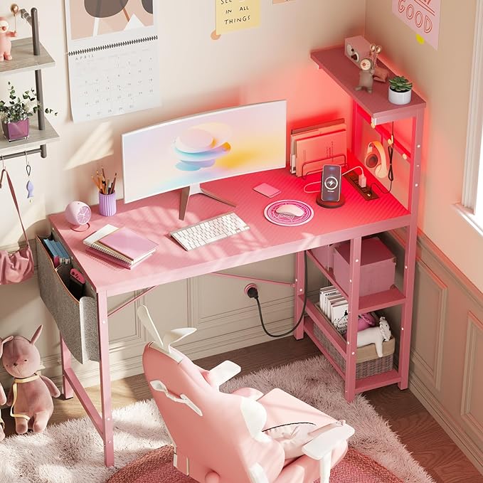 Bestier Pink Gaming Desk with Power Outlets, 44 Inch Led Gamer Desk with 4 Tiers Reversible Shelves, Pink Computer Desk with Headset Hook & Side Storage Bag for Bedroom (Pink 3D Carbon Fiber) - LeafyLoom
