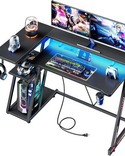 Computer Gaming Desk with Power Outlet & LED Lights, 47 Inch L Shaped Gamer Table with Storage Shelves for Bedroom, Reversible Corner Home Office Desk, Carbon Fiber Black - LeafyLoom