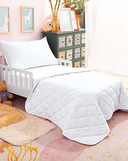 NTBAY Toddler Bedding Set - 4 Piece Soft and Breathable Crib Bedding Set for Boys and Girls, Includes Quilted Comforter, Fitted Sheet, Flat Top Sheet and Envelope Pillowcase, White - LeafyLoom