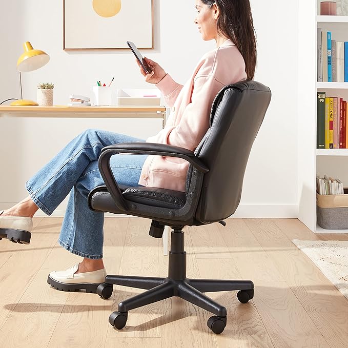 Amazon Basics Office Computer Task Desk Chair with Padded Armrests, Mid-Back, Adjustable, 360 Swivel, Rolling, 275 Pound Capacity, BIFMA Certified, 24.2"D x 24"W x 34.8"H, Black Faux Leather - LeafyLoom
