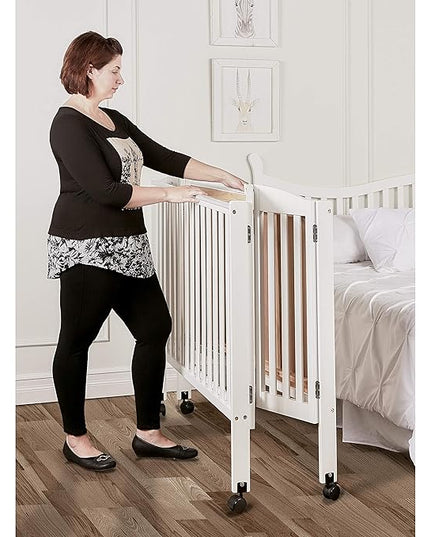 3 in 1 Portable Folding Stationary Side Crib in White, Greenguard Gold Certified, Safety Wheel with Locking Casters, Convertible, 3 Mattress Heights - LeafyLoom