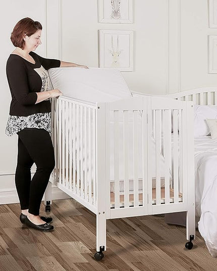 3 in 1 Portable Folding Stationary Side Crib in White, Greenguard Gold Certified, Safety Wheel with Locking Casters, Convertible, 3 Mattress Heights - LeafyLoom