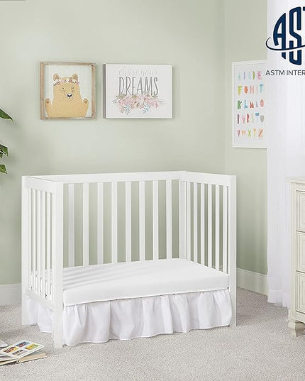 Edgewood 4-In-1 Convertible Mini Crib In White, JPMA Certified, Non-Toxic Finish, New Zealand Pinewood, With 3 Mattress Height Settings, Included 1" Mattress Pad - LeafyLoom