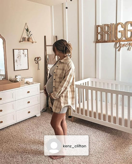 Delta Children Essex 4-in-1 Convertible Baby Crib, Bianca White with Natural Legs - LeafyLoom