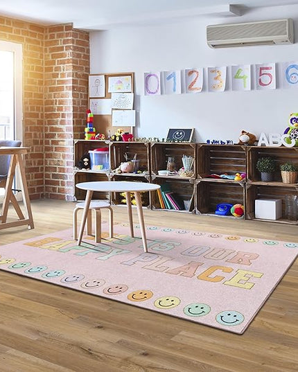Flagship Carpets Schoolgirl Style This is Our Happy Place on Pink Educational Area Rug for Kids Room Seating Décor, Children's Classroom, Play Carpet for Teaching and Playroom, 5' x 7'6" - LeafyLoom