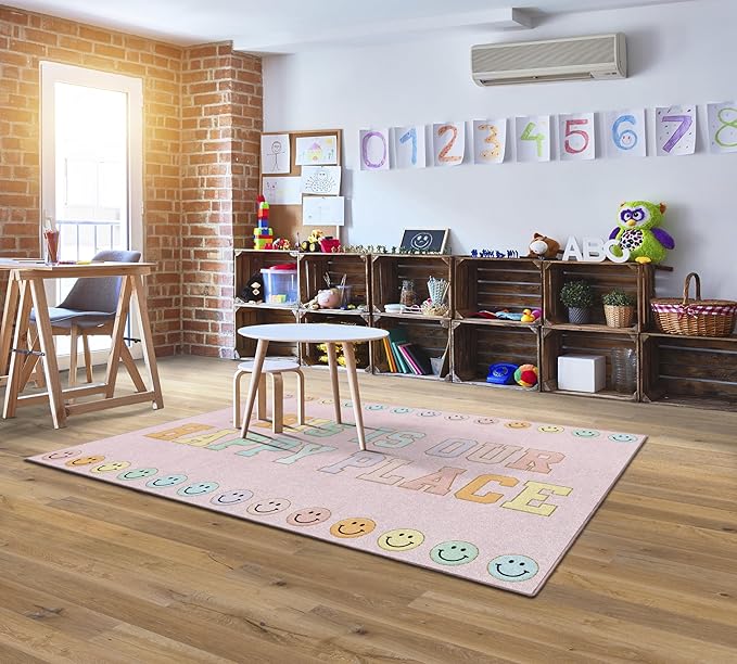 Flagship Carpets Schoolgirl Style This is Our Happy Place on Pink Educational Area Rug for Kids Room Seating Décor, Children's Classroom, Play Carpet for Teaching and Playroom, 5' x 7'6" - LeafyLoom
