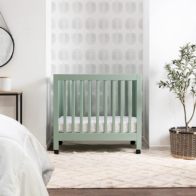 Babyletto Origami Mini Portable Crib Folding with Wheels in Light Sage, 2 Adjustable Mattress Positions, Greenguard Gold Certified - LeafyLoom