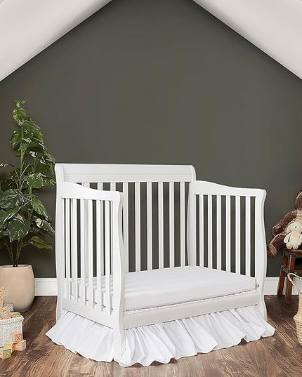 Aden 4-in-1 Convertible Mini Crib In White, Greenguard Gold Certified, Non-Toxic Finish, New Zealand Pinewood, With 3 Mattress Height Settings - LeafyLoom